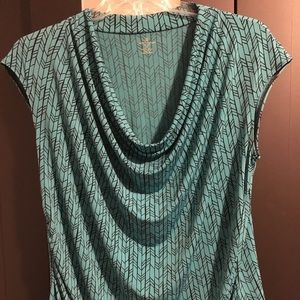 Teal cowl neck sleeveless blouse.